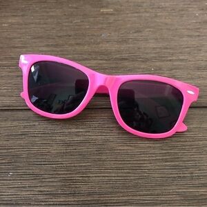 Girl’s pink sunglasses